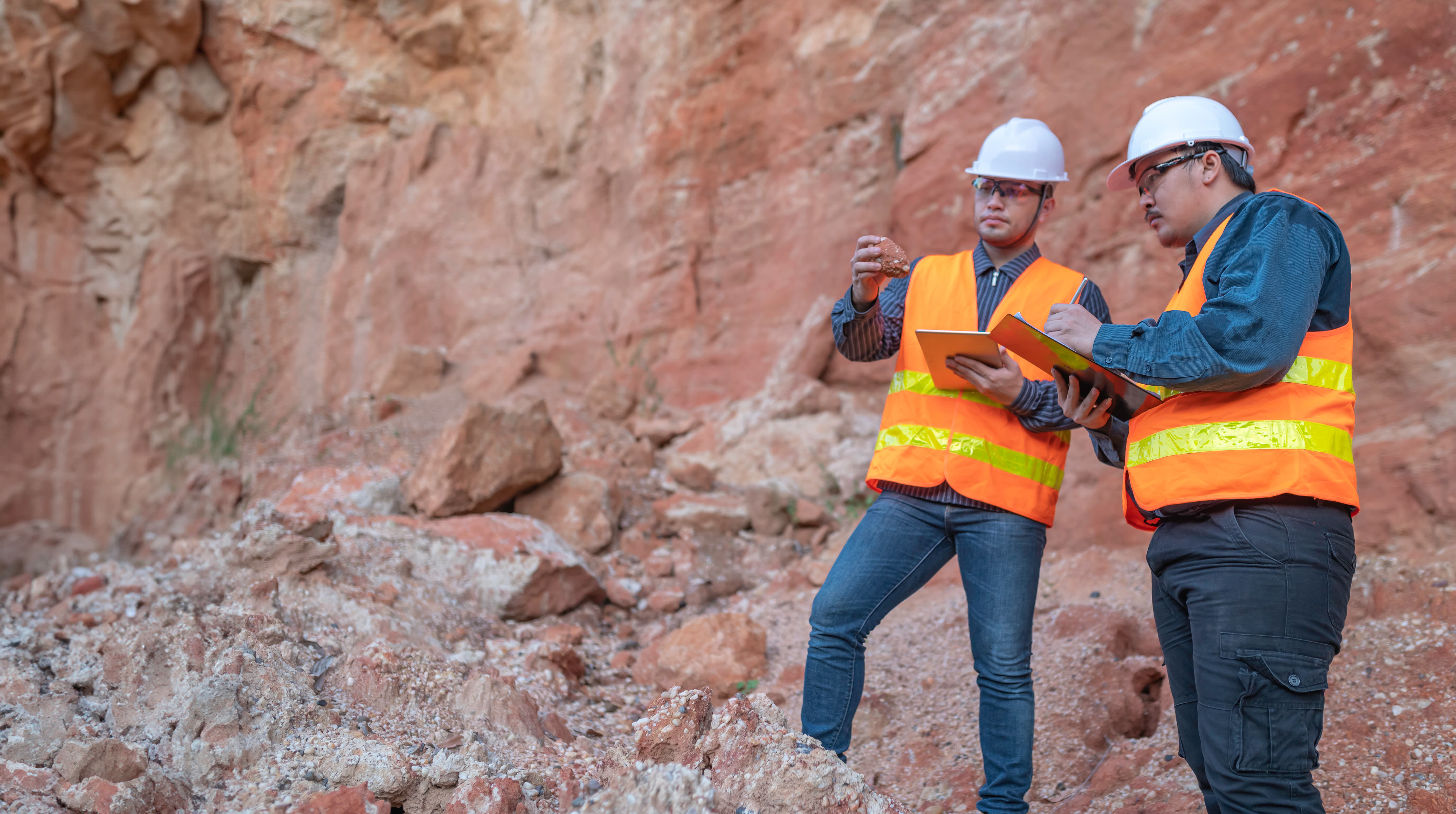 Geologist looking at samples